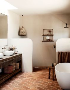 the bathroom is clean and ready to be used as a bathtub or shower stall