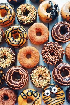 there are many different donuts on the table together, including one with an eye