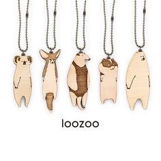 four wooden animals are hanging from chains on a white background with the words loozo