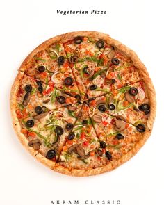 a pizza with olives, peppers and other toppings on it's crust