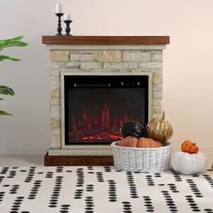 a living room with a fireplace and black and white decor