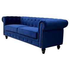 a blue couch sitting on top of a white floor