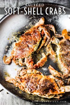 some food is being cooked in a pan on the wooden table and ready to be eaten