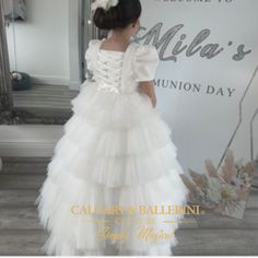 First Communion Dress White Ruffle Dress is truly remarkable. Handcrafted with luxury couture quality, this stunning snow white gown is sure to make your special day memorable. Made from top-of-the-line fabrics, with high-quality feather and lace decorations, it will make any little girl feel like a princess. Perfect for first communions, holy communions and baptism christenings, this luxurious custom-made gown is modeled after a floor length ballgown with a beautiful corset closure at the back Snow White Gown, Tulle Ruffle Skirt, White Communion Dress, Lace Decorations, Corset Closure, Beautiful Corset, Fairytale Aesthetic, Skirt Satin, Pleated Tulle