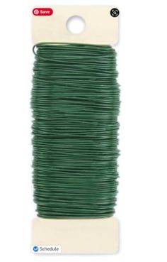 green wire spooling on a white background