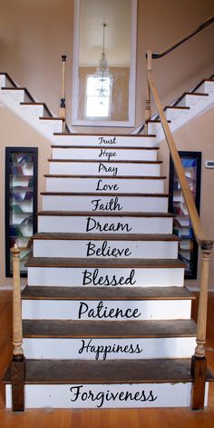 the stairs are painted with different words on them