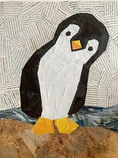 a penguin made out of newspaper strips sitting on top of a pile of rocks and paper