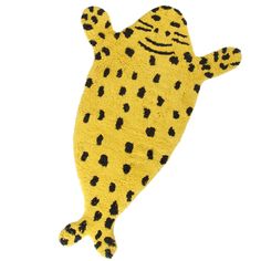 a yellow and black rug with a cat on it's back legs in the shape of a cheetah