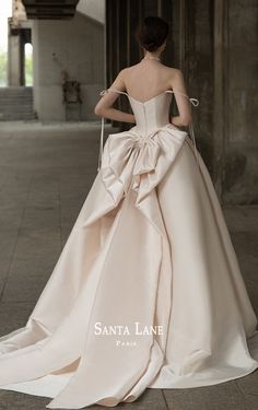 the back of a woman in a wedding dress