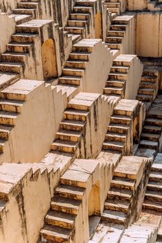 many wooden steps are stacked together in an area that looks like it is made out of concrete