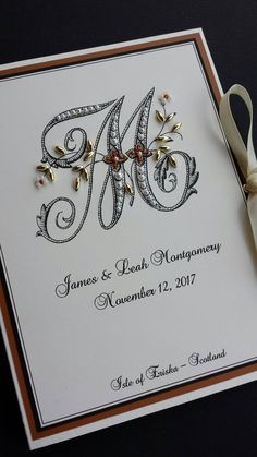 a pair of scissors sitting on top of a wedding card