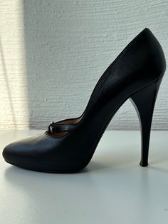 Loewe shoes, black, 100% genuine leather inside, outside and sole. Used once. Excellent condition. Size 38. Made in Italy. Heel height - 12 cm. Elegant Round Toe Heels With Rubber Sole, Elegant Heels With Rubber Sole For Evening, Elegant Evening Heels With Rubber Sole, Timeless Calf Leather Heels With Round Toe, Chic Evening Heels With Rubber Sole, Evening Heels With Almond Toe And Rubber Sole, Evening High Heel Leather Shoes With Leather Sole, Evening Closed Toe Heels With Rubber Sole, Evening Heels With Closed Toe And Rubber Sole