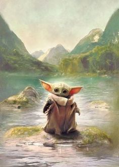 the child yoda is sitting on top of a rock in water with mountains in the background