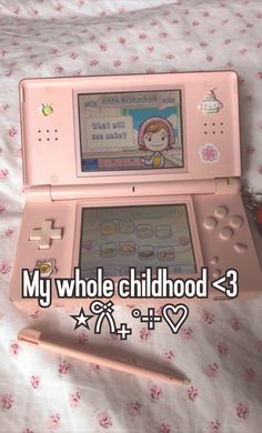 a pink nintendo wii game system with the words my whole childhood - 3 on it