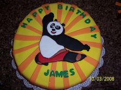 a birthday cake with a panda bear on it