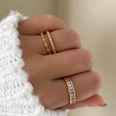 If you love intricacy, this is the ring for you. Six crystals are carefully placed and laden with milgrain detailing between and around the stones. Just a stunning feat of art on a dainty band.  MATERIALS: Gold Plated, Brass Cubic Zirconia  Need some jewelry inspiration? Follow us on Instagram @statementGrey Pave Eternity Band, Milgrain Ring, Dainty Band, Minimal Ring, Eternity Band Ring, Gold Band Ring, Gifts For My Sister, Ring Dainty, Stackable Ring