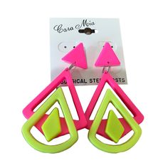 two pairs of neon pink and green earrings with triangle shapes on them, sitting next to each other