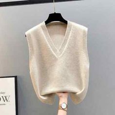 Find ideas๏ฟฝand inspiration for Women Sweaters Vest Spring Autumn Fashion New Sleeveless V-neck Casual, Fashion Women's Sweaters Sleevless Sweater, Knitting Sweater, Sweater Vest Women, Mode Casual, Sleeveless Pullover, Knitted Tops, Women Sleeve, Loose Tops, Sleeveless Sweater