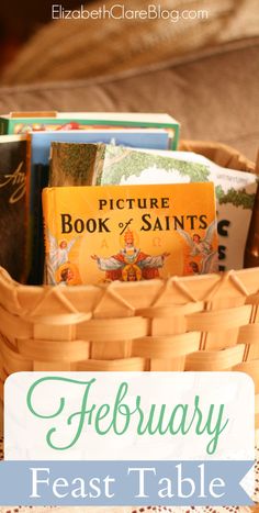 a basket filled with books sitting on top of a table