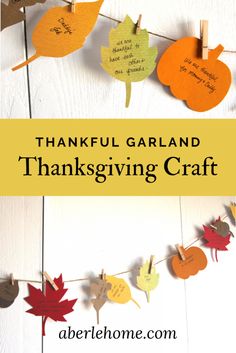 the words, thanksgiving garland are hanging from clothes pins with leaves and pumpkins on them