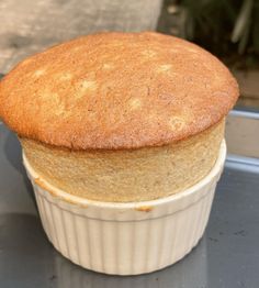 a close up of a cake in a pan on a table