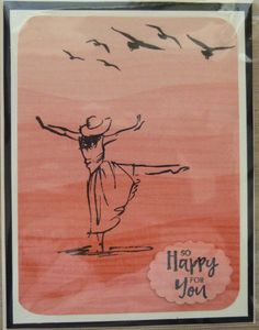 a card with a drawing of a woman dancing on the beach and birds flying overhead