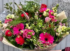 a bouquet of flowers sitting on top of a table