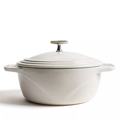 a white casserole dish with a lid