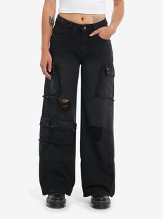 Mix grunge and function for your next statement look! These black  wide leg pants feature frayed cargo pockets on the legs  plus destruction. Comes with hip pockets and faux pocket flaps on the back.90% cotton; 2% polyester; 8% viscoseWash cold; dry lowLength: 30''ImportedListed in junior sizesModel is 5'8''Model wears size Small Cargo Wide Leg Pants, Cutesy Outfit, Black Wide Leg Pants, Pants Straight, Girls Jeans, Christmas List, Hot Topic, Wide Leg Jeans, Denim Pants