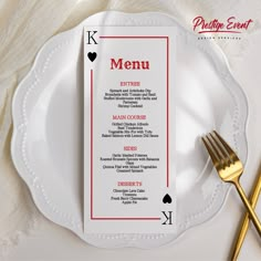 a white plate topped with a menu next to a fork and knife on top of a table