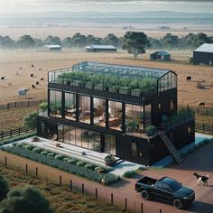 a black truck parked in front of a tall building with plants growing on it's roof