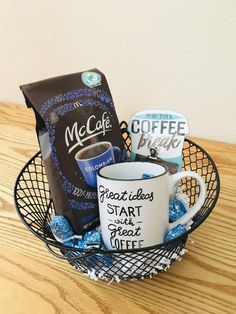 a coffee mug and some snacks in a basket