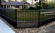 an iron fence is shown in front of a house with the words residential style 9 on it