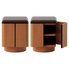 two wooden cabinets with black leather tops