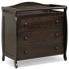 a baby crib with three drawers in it