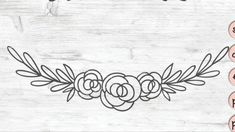 a wooden background with flowers and leaves on the bottom, in pink letters that spell out love