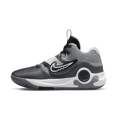 the nike zoom basketball shoe in grey and white with black accents on the upper part