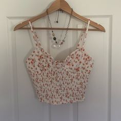 Forever 21 White, Peach & Pink Floral Sweetheart Bustier Crop Camisole Blouse With Adjustable Straps. Size Medium. Nwt. Stretch. Cotton, Polyester & Elastane. Please Send Reasonable Offers Through The Offer Button! Follow To Keep Updated! (Y14) Feminine Spring Crop Top With Built-in Bra, Spring Feminine Bra Friendly Camisole, Spring Feminine Bra-friendly Camisole, Fitted Floral Print Tank Top For Day Out, Trendy Bra-friendly Camisole For Spring, Cute Fitted Tank Top For Spring, Spring Bra-friendly Sleeveless Camisole, Fitted Spaghetti Strap Summer Crop Top, Fitted Spaghetti Strap Crop Top For Summer