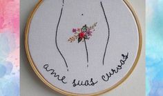 a hand embroidered picture with the words, we are just friends on it and flowers