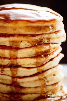 a stack of pancakes covered in syrup