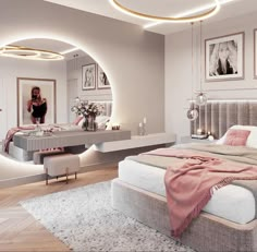 a woman taking a selfie in the mirror of a bedroom with a large bed