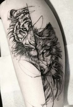 a tattoo on the arm of a woman that has a tiger and lion in it