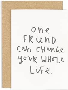 a white card with the words one friend can change your whole life on it's front