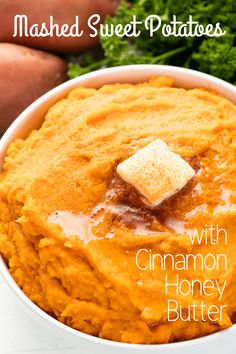 a white bowl filled with mashed sweet potatoes