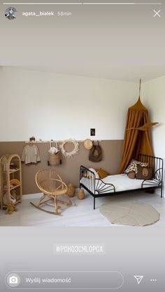 an image of a bedroom setting with furniture and decor on the walls, including a baby crib