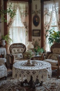 a living room filled with lots of furniture and flowers in vases on the table