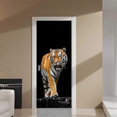 an image of a tiger walking through the dark room door sticker on a wall