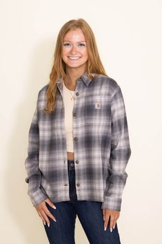 A fall must have, is this Carhartt Loose Fit Midweight Flannel for Women in Grey! You can’t go wrong with the plaid print, lightweight feel, comfortable fit, and versatile design on this one. Wear buttoned all the way up for a classy shirt look, or over a white tee as a layering piece for a more casual look! Features: Carhartt Style: 105574-APH Color: Asphalt 97% Cotton 3% Elastane Women’s flannel shirts Plaid print Full button-down closure Button sleeve cuffs and fold down collar Two button che Flannel Outfit Women, Carhartt Shop, Carhartt Flannel, Carhartt Style, Plaid Shirt Women, Flannel Outfits, Fall Must Haves, Flannel Shirts, Grey Flannel