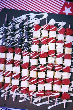 an american flag made out of marshmallows and strawberries