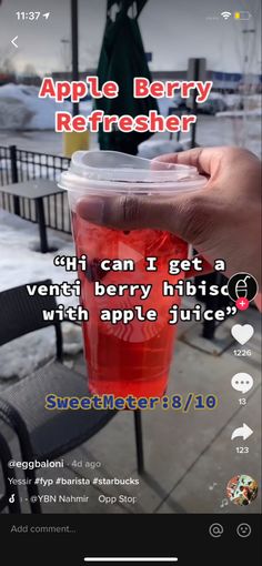 someone is holding a plastic cup with liquid in it and the caption reads, apple berry refresher